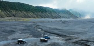 A 4x4 jeep demonstrating how to get to bromo from the village, highlighting the adventure you will experience with a reliable jeep tour booking.