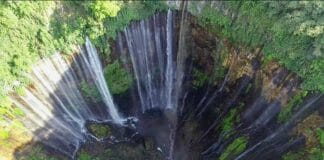A breathtaking panoramic view showing how to get to Tumpak Sewu Waterfall in East Java.